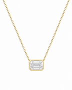A delicate yellow gold chain necklace featuring a rectangular bezel-set clear emerald-cut gemstone pendant, shown against a plain white background.