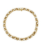 14k gold Orbit diamond tennis bracelet, bezel-set