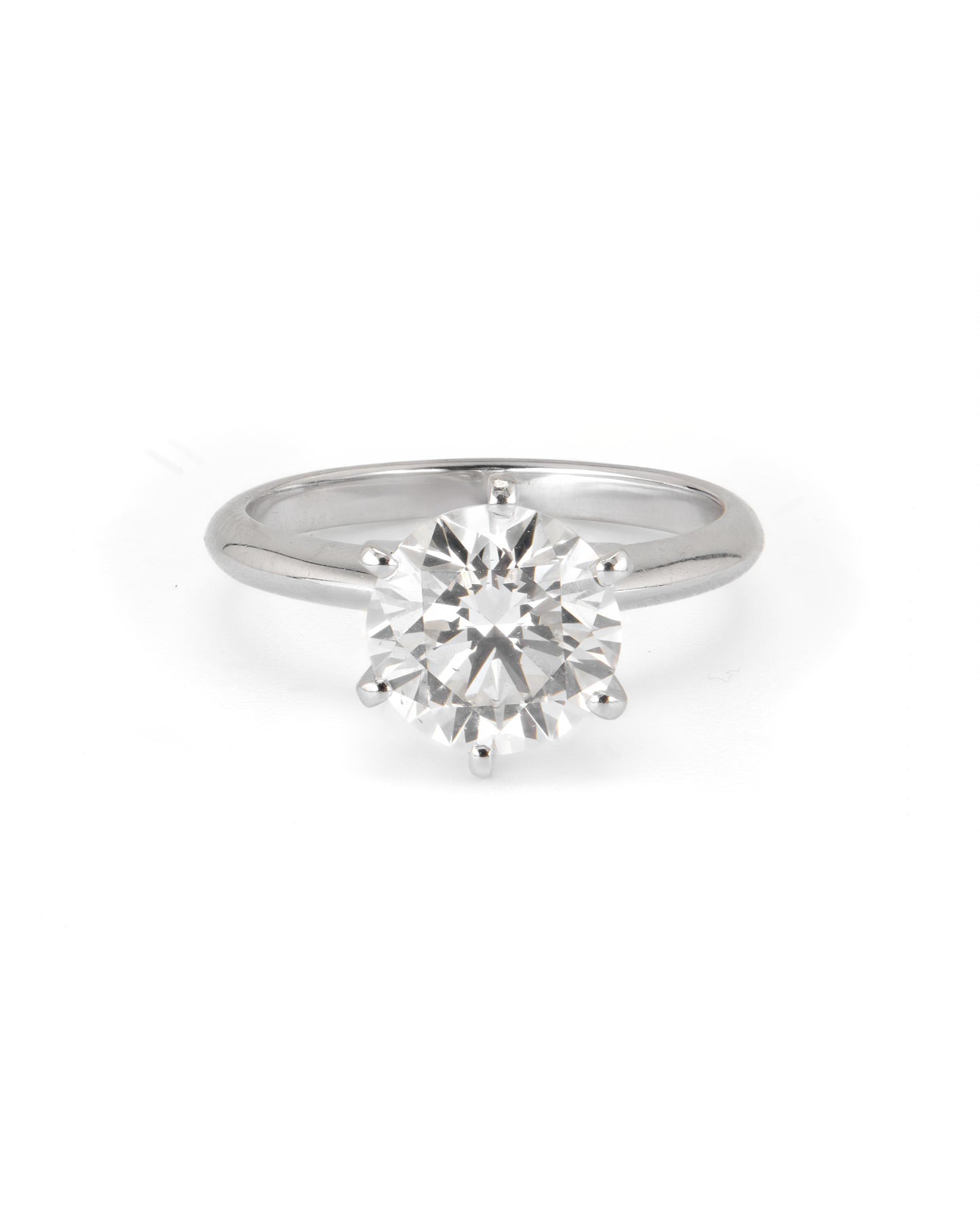 A round solitaire engagement ring with a 2.40 CT natural diamond, set in a 6-prong setting, on a white background.