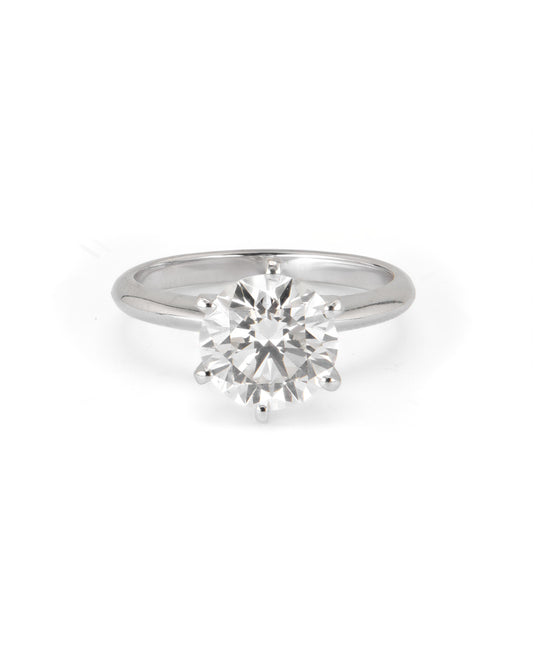 A round solitaire engagement ring with a 2.40 CT natural diamond, set in a 6-prong setting, on a white background.