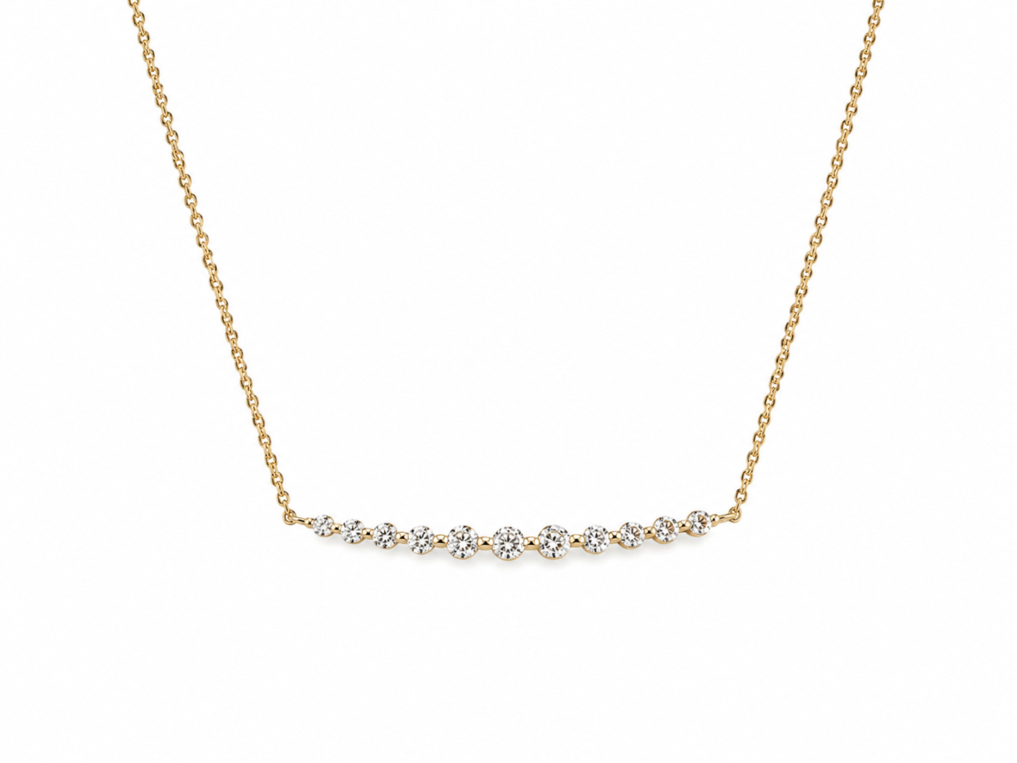 Gold necklace with small diamonds on a white background