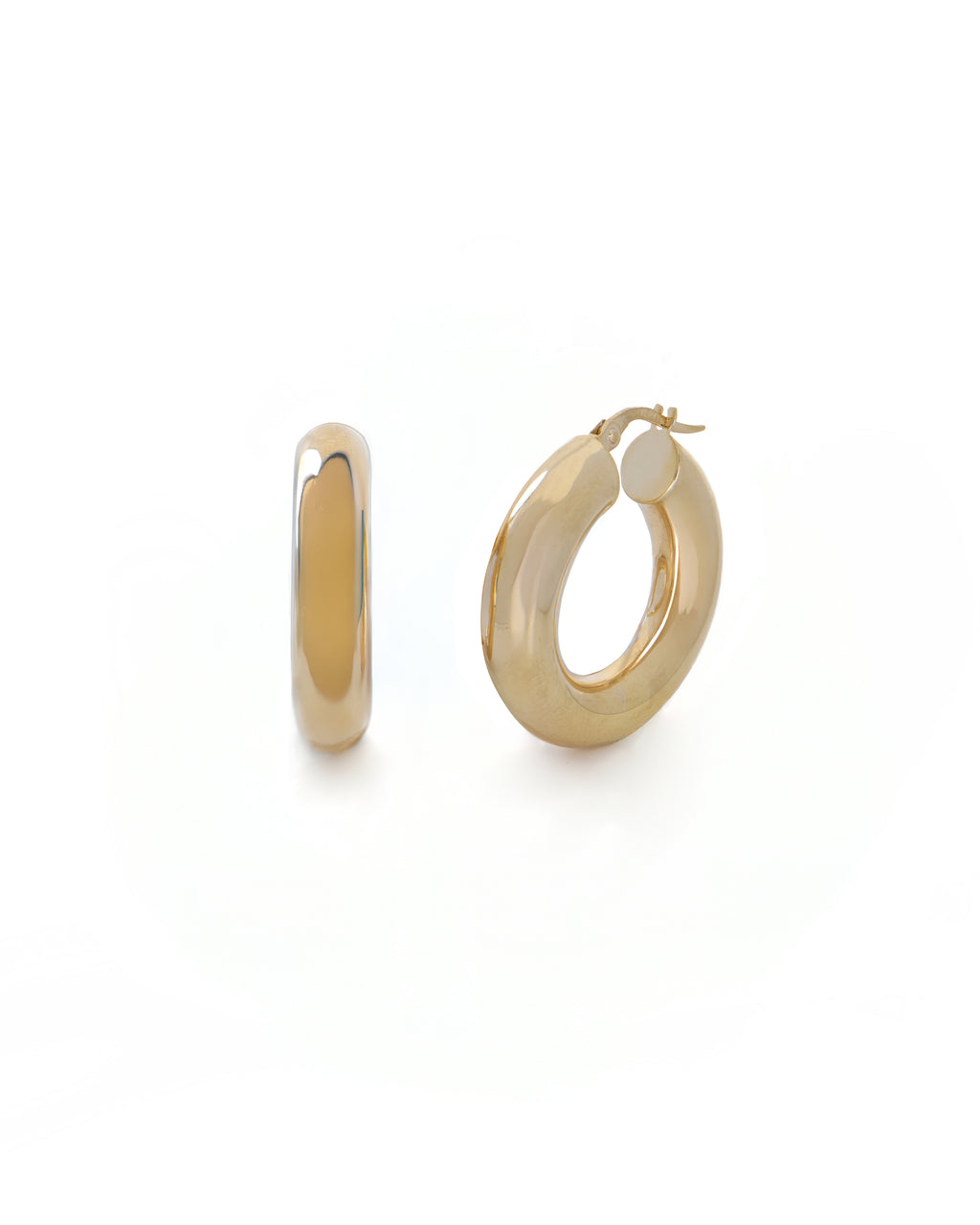 Gold hoop earrings on a white background