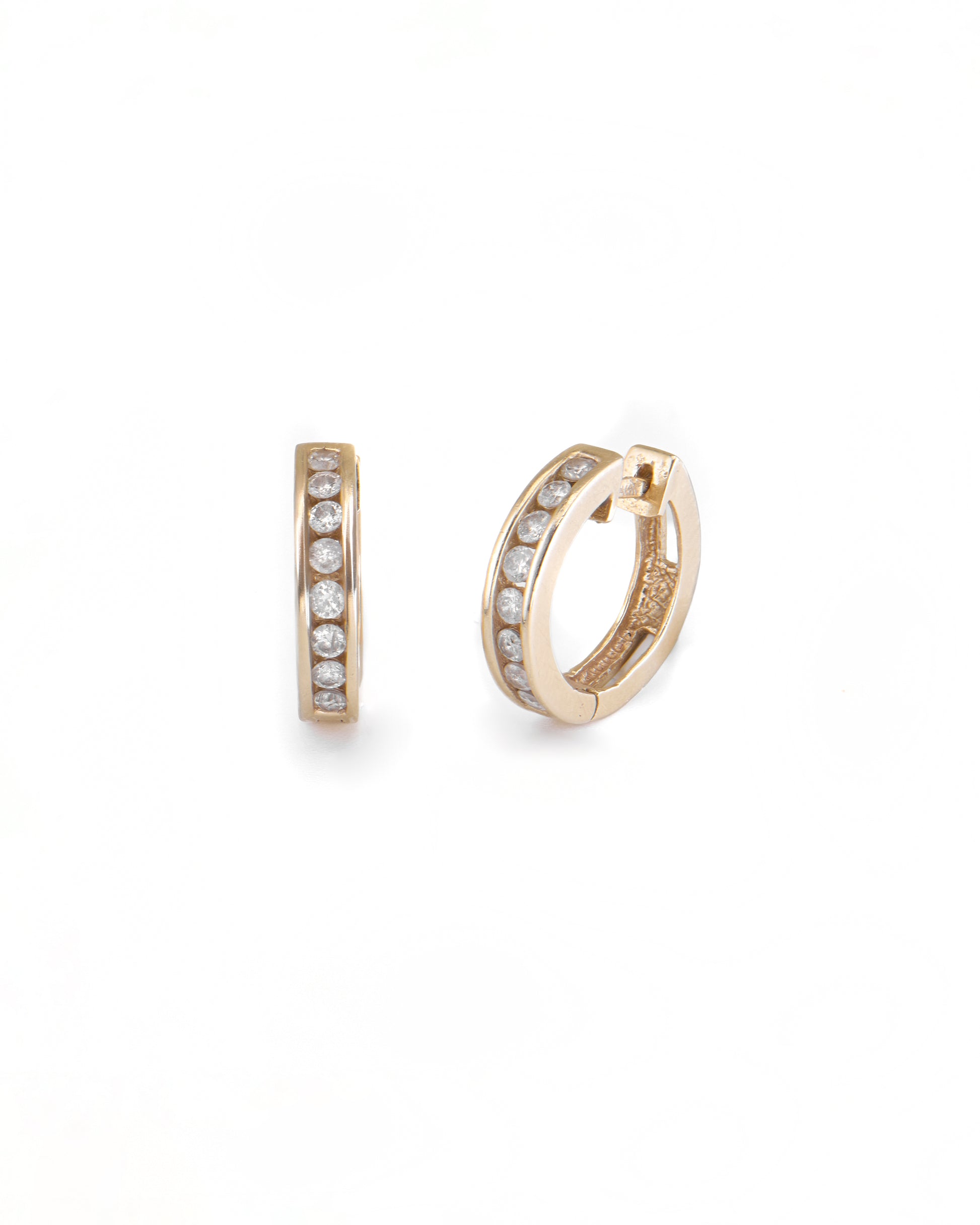 Gold hoop earrings with embedded stones on a white background