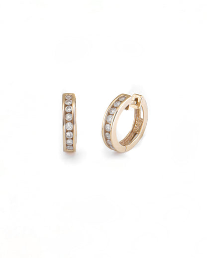Gold hoop earrings with embedded stones on a white background