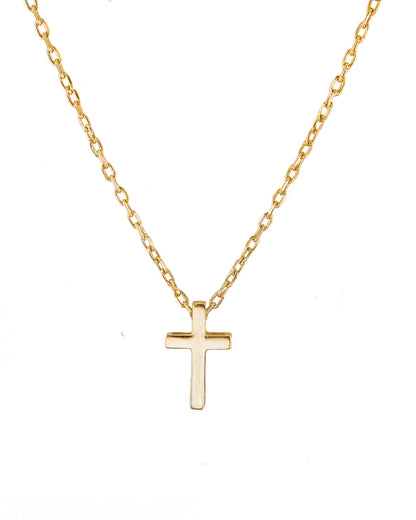 Gold cross necklace on a white background