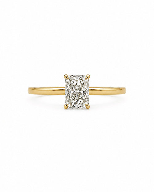 Cushion cut diamond engagement ring, yellow gold, solitaire setting