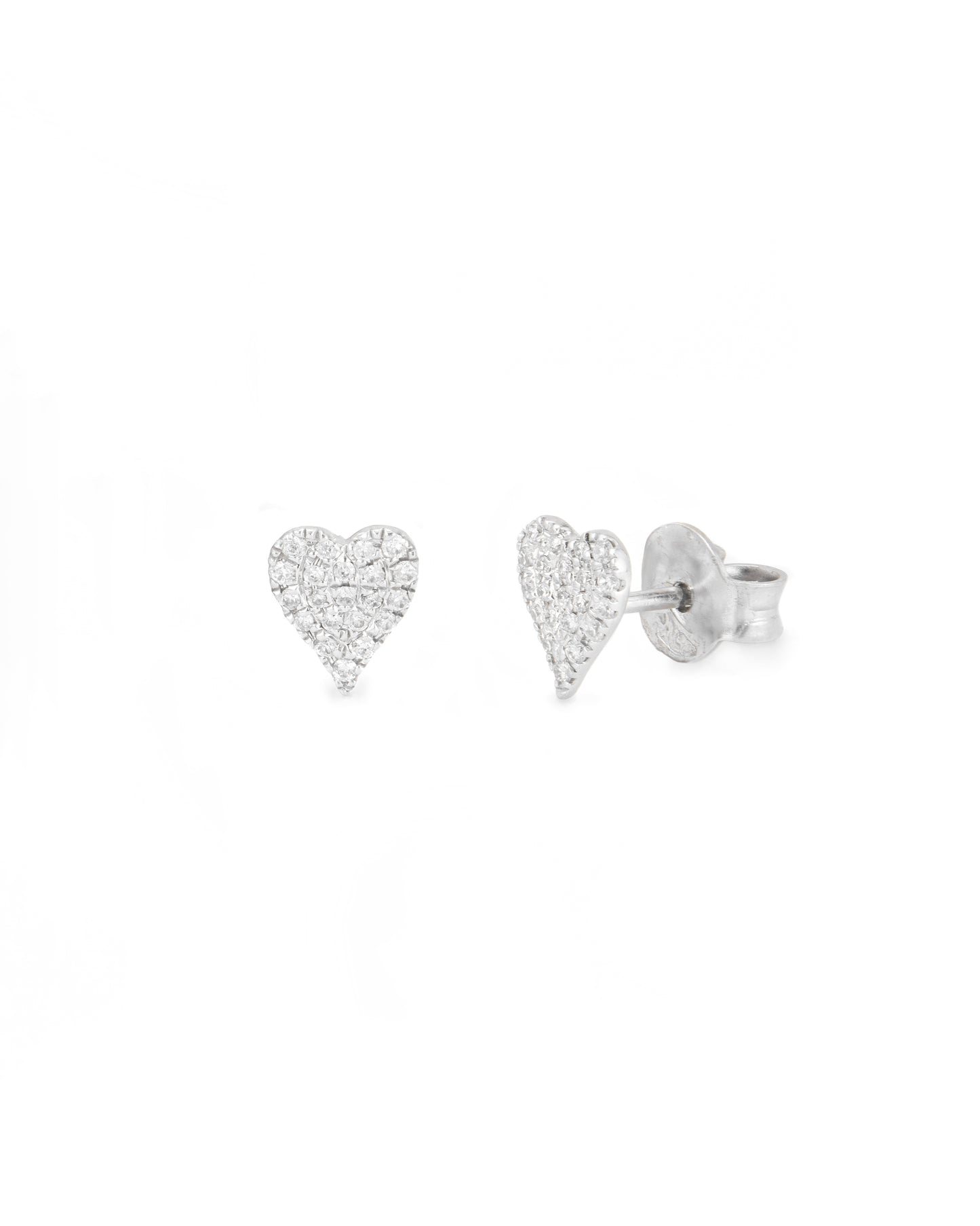 Heart-shaped silver earrings on a white background