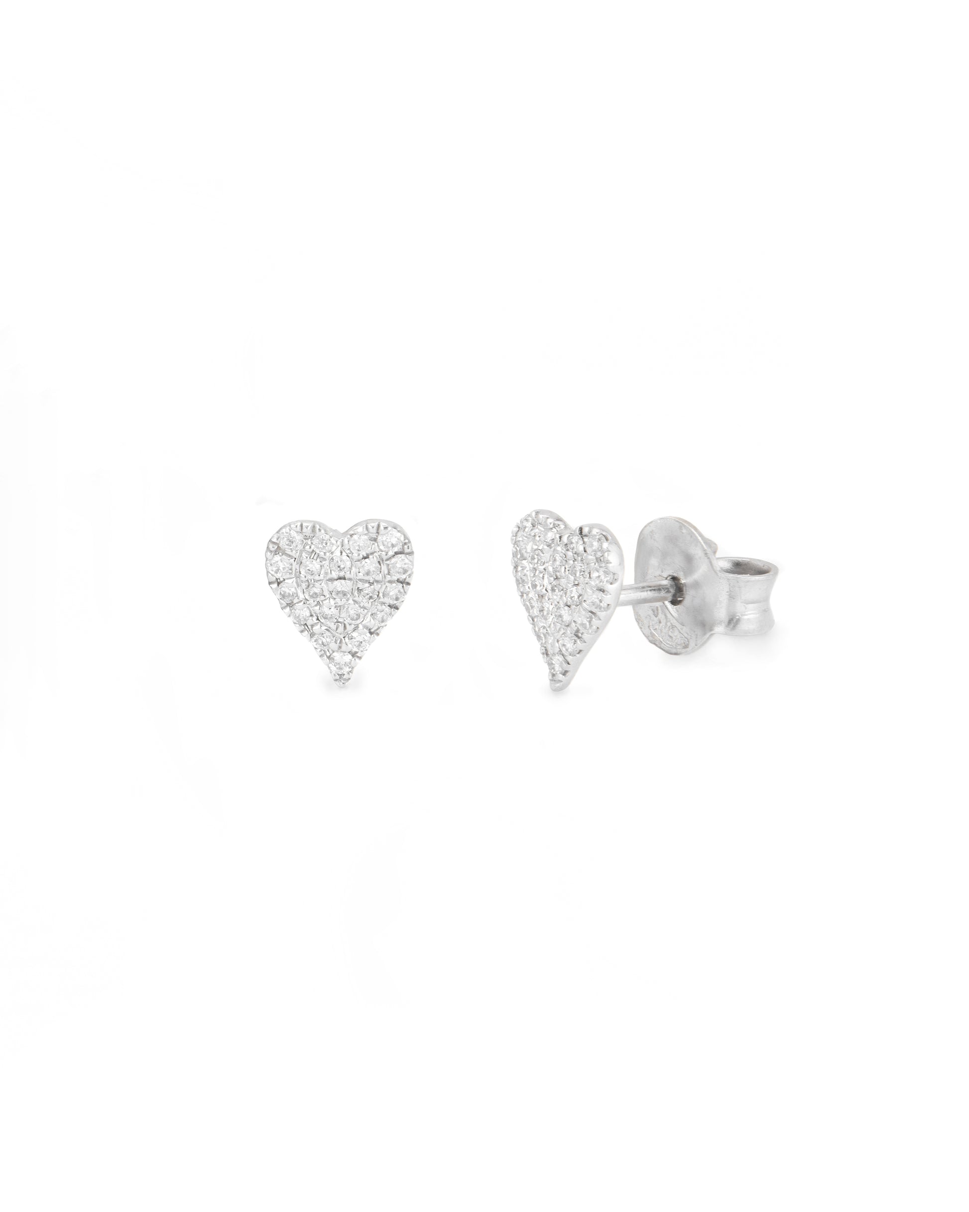 Heart-shaped silver earrings on a white background