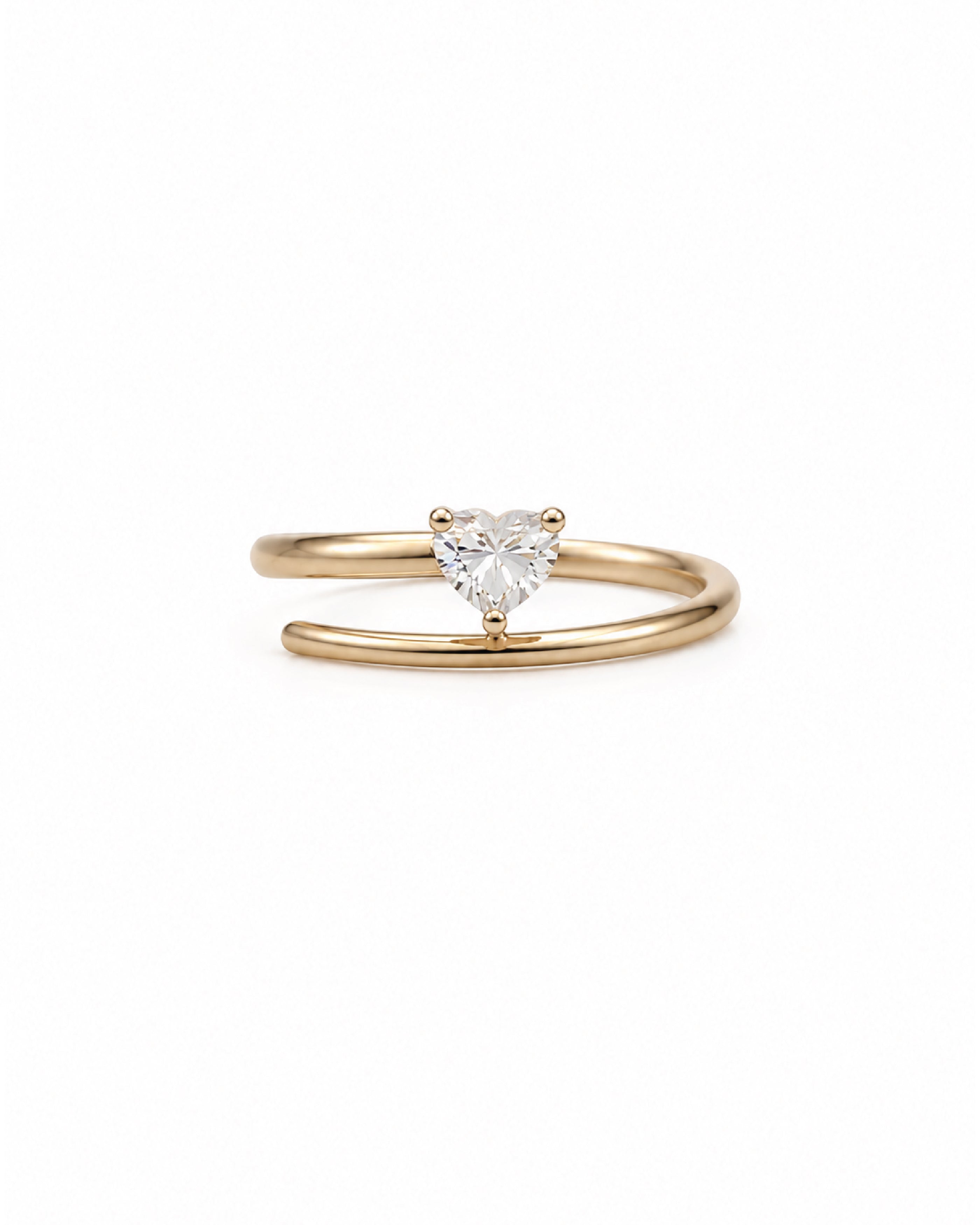 A 14k gold open band ring featuring a small, heart-shaped diamond in the center, set against a plain white background.