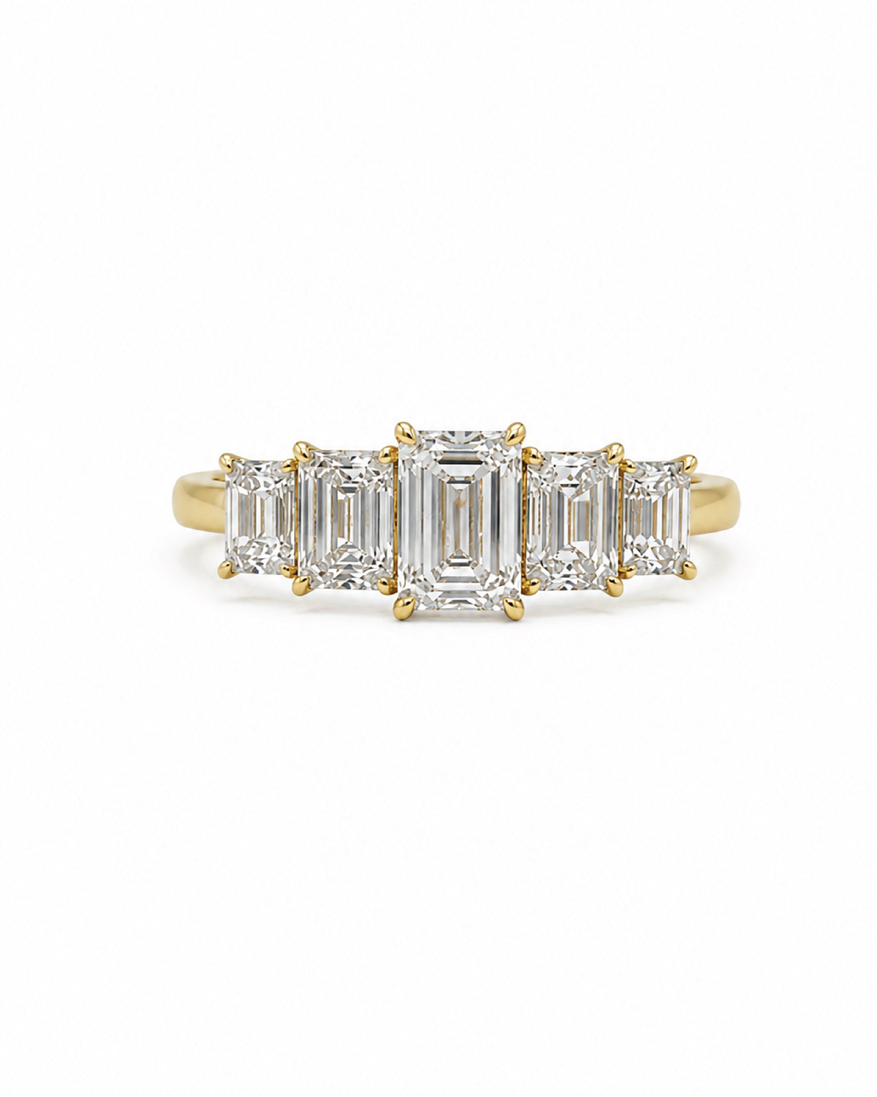 Five stone diamond engagement ring, emerald-cut center stones