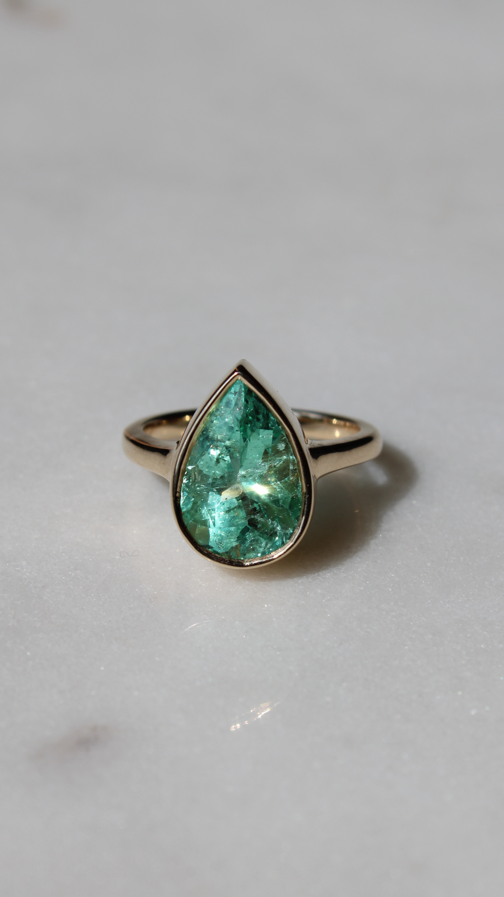 Pear Shaped Emerald Bezel Set Ring