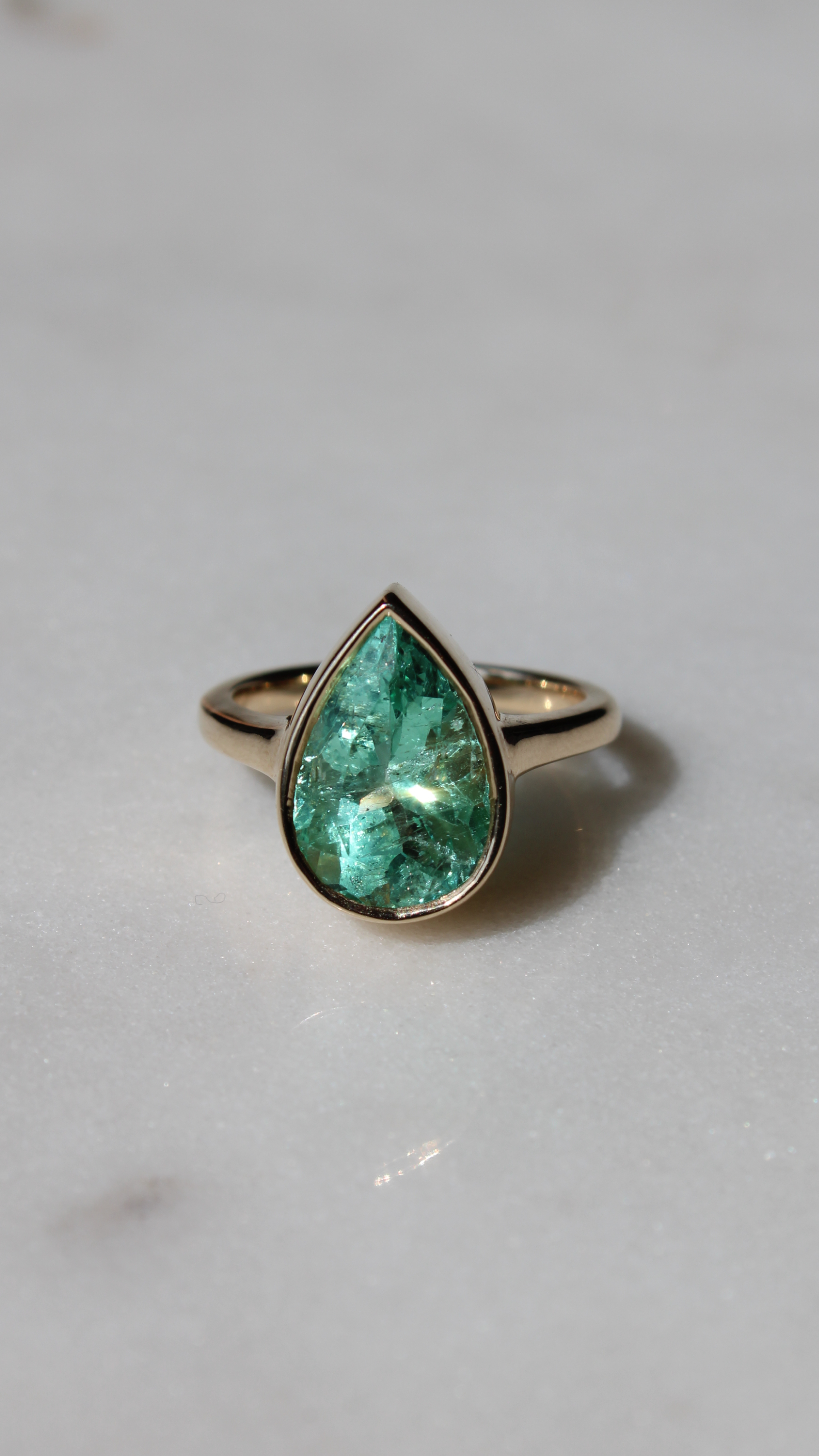 Pear Shaped Emerald Bezel Set Ring