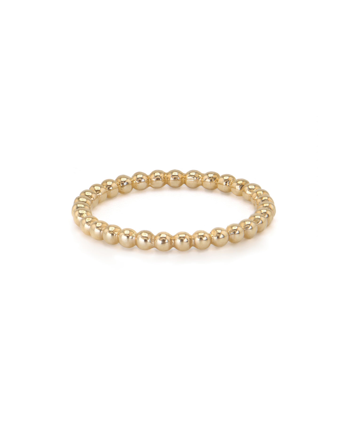 A gold bead stacker ring with a smooth finish and polished surface, displayed against a white background