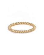 A single gold rope stacker ring with a twisted design, displayed against a white background