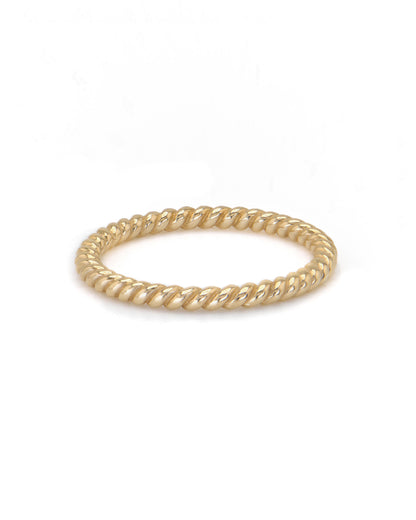 A single gold rope stacker ring with a twisted design, displayed against a white background