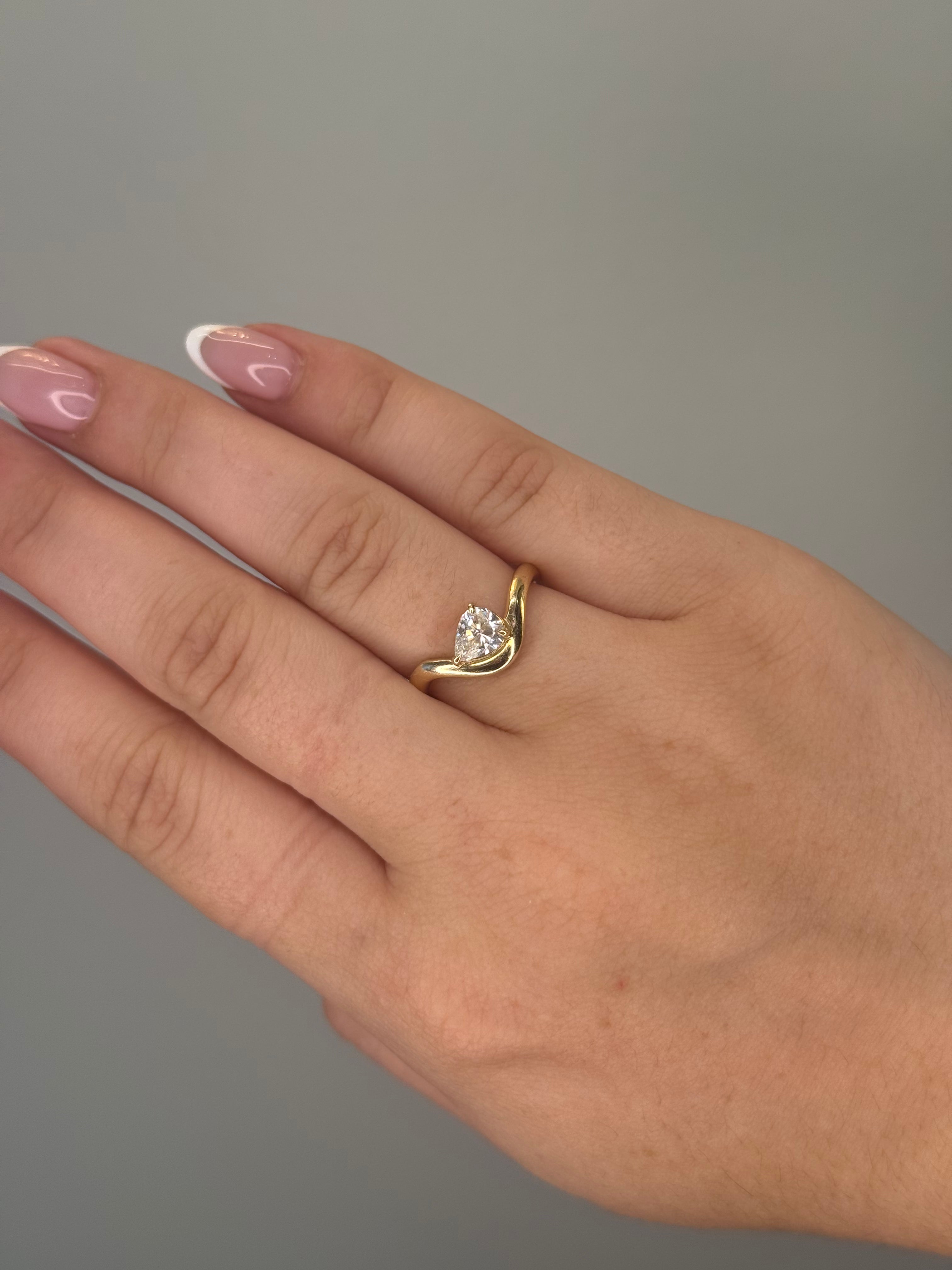 14k gold pear diamond dip ring, sculptural curved band