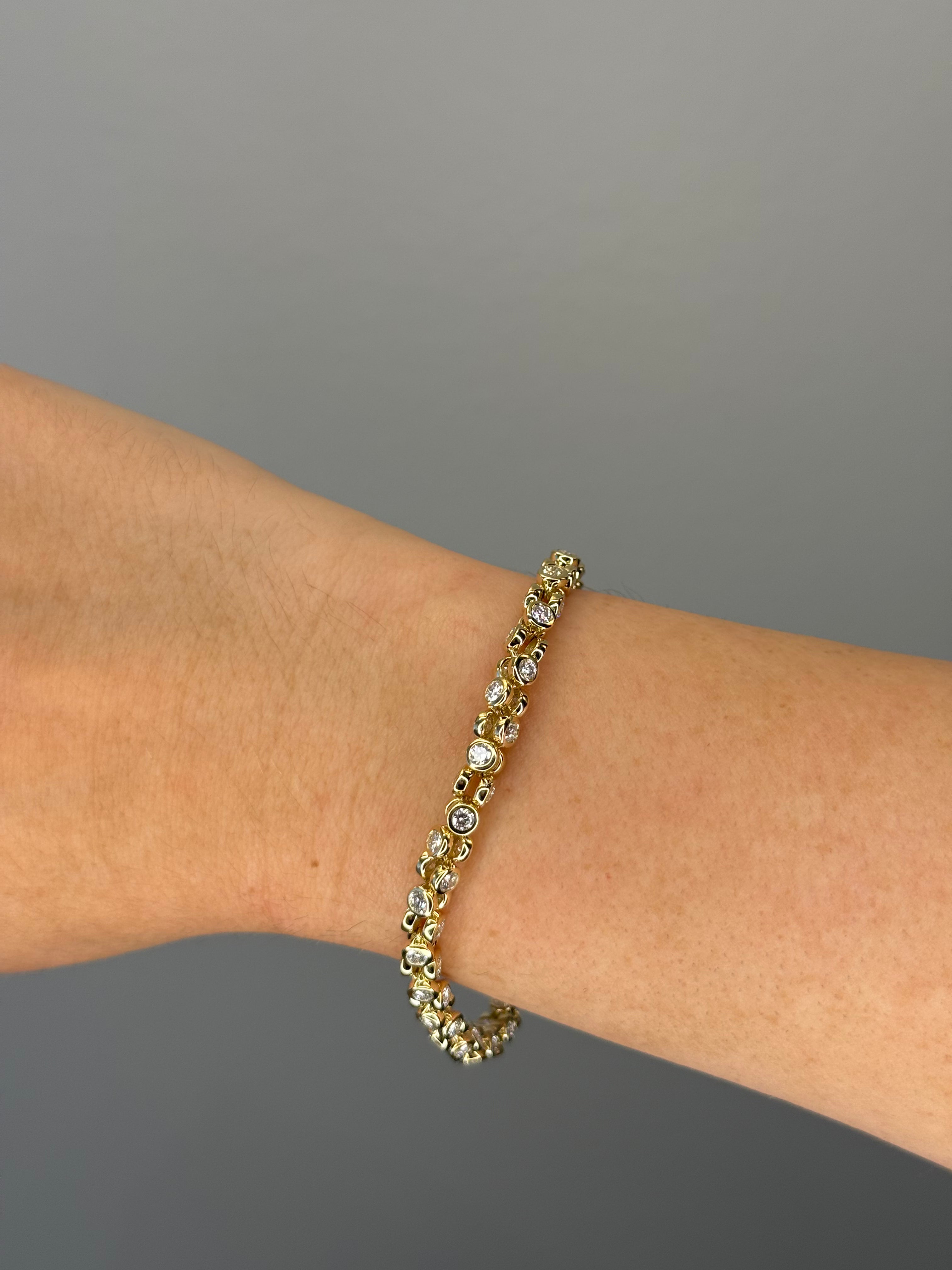 Orbit tennis bracelet worn on wrist, close-up