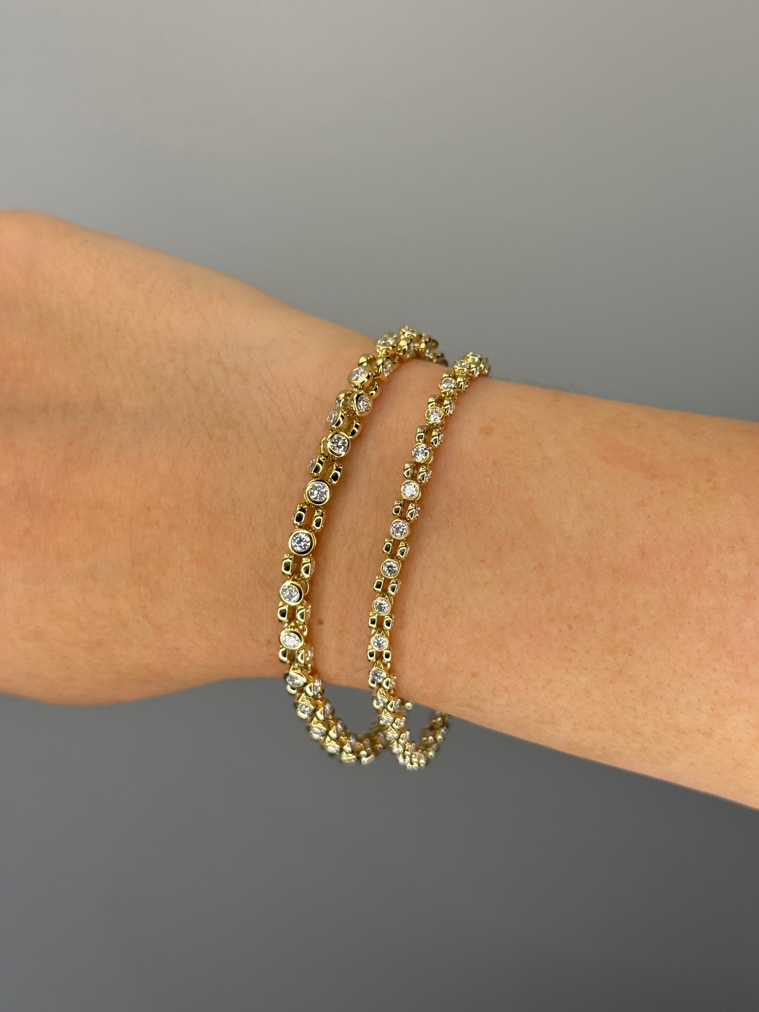 Orbit tennis bracelet worn on wrist, close-up