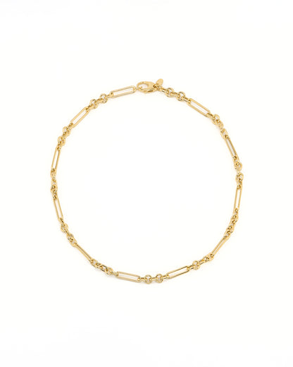 Gold chain bracelet on a white background