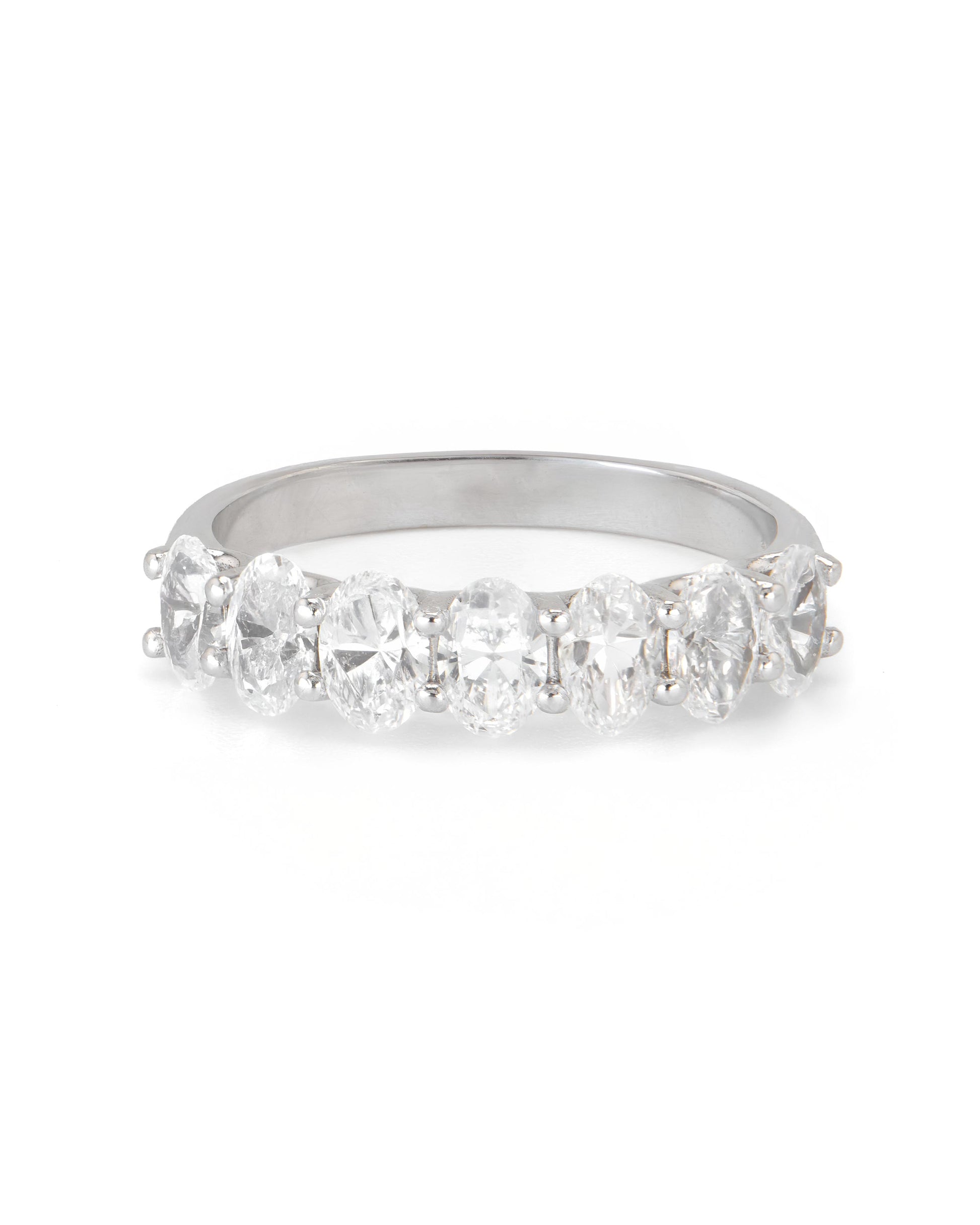 A band ring with multiple oval-shaped diamonds set in a row.