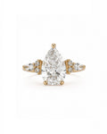 Pear cut diamond engagement ring, yellow gold, side stone setting