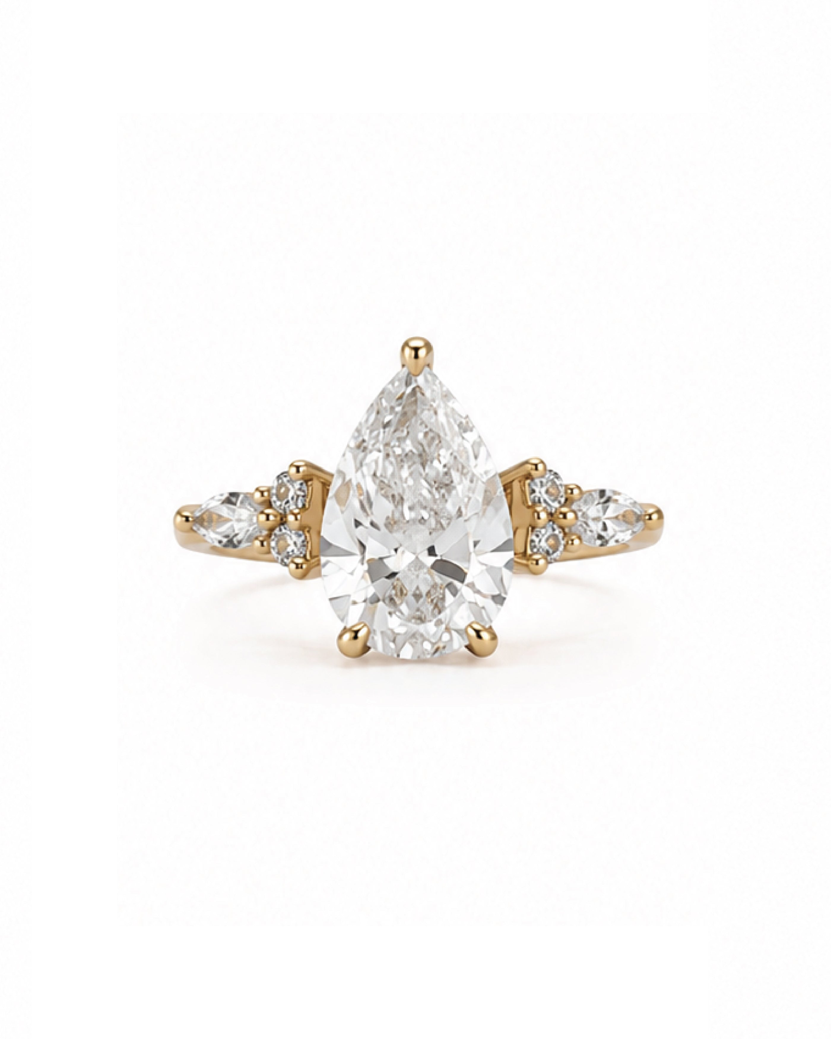 Pear cut diamond engagement ring, yellow gold, side stone setting