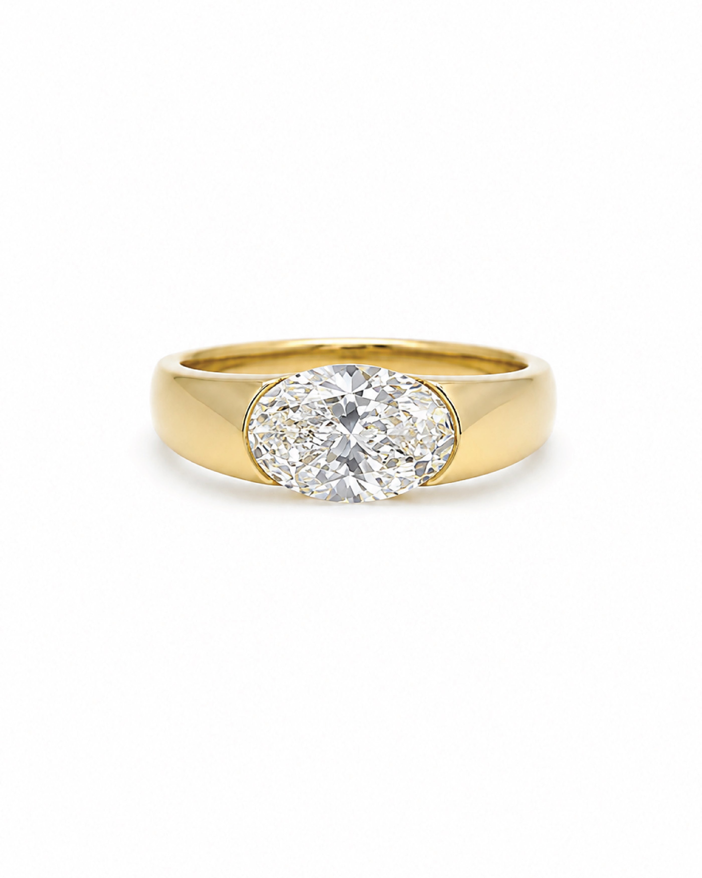 East-west oval diamond engagement ring, wide gold band