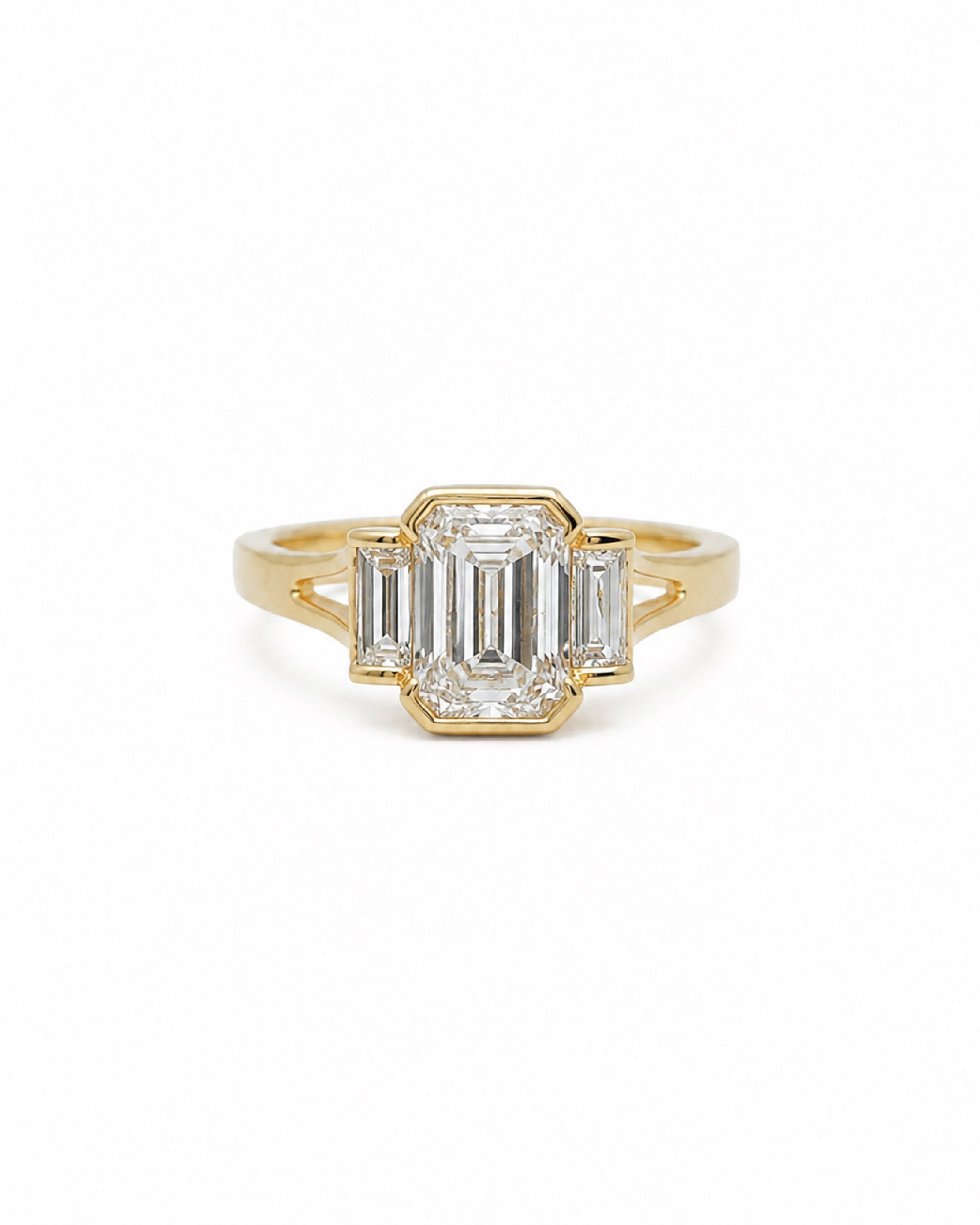 Three stone diamond engagement ring, emerald-cut center stone