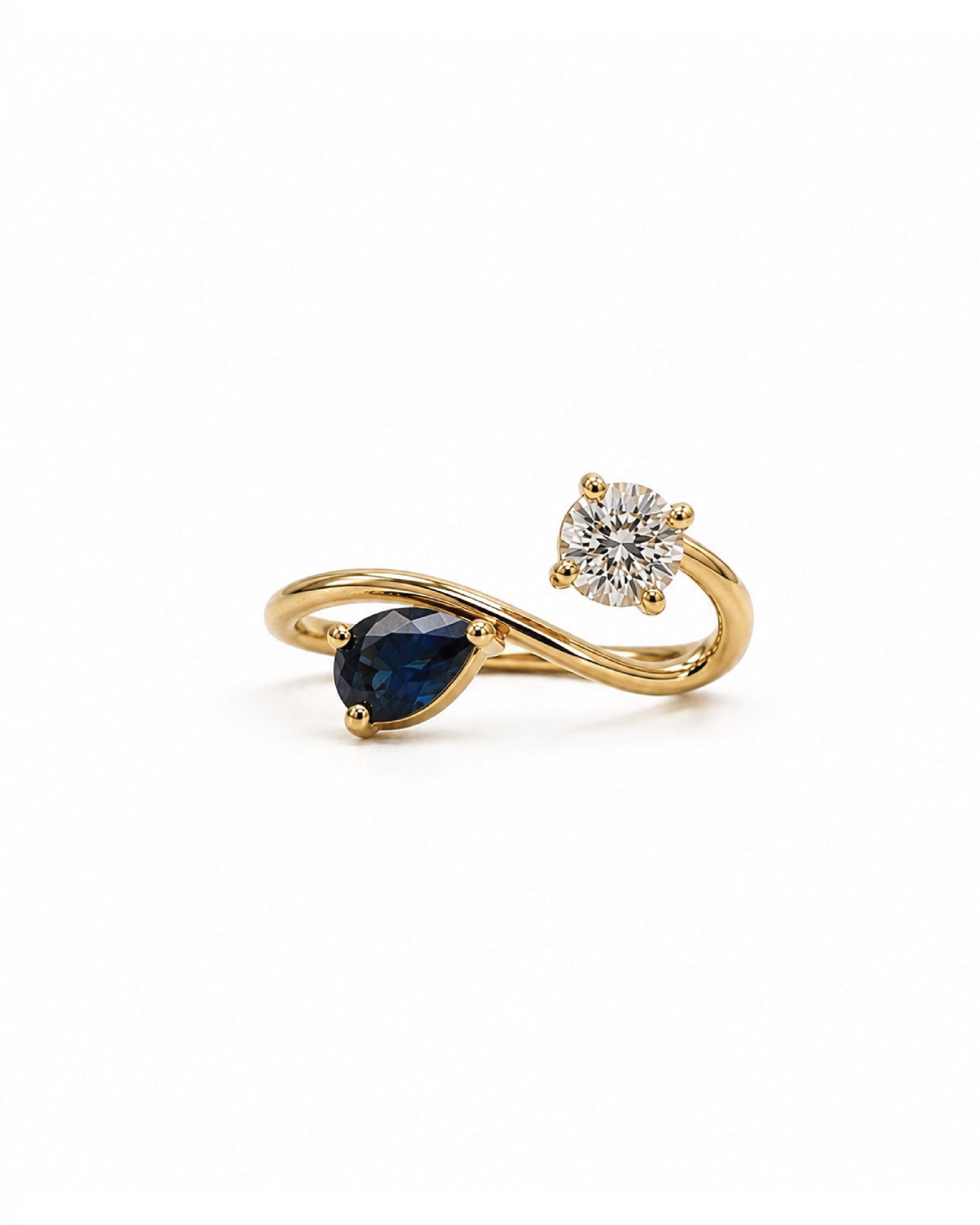 Toi et Moi blue sapphire and diamond ring, yellow gold, bypass design