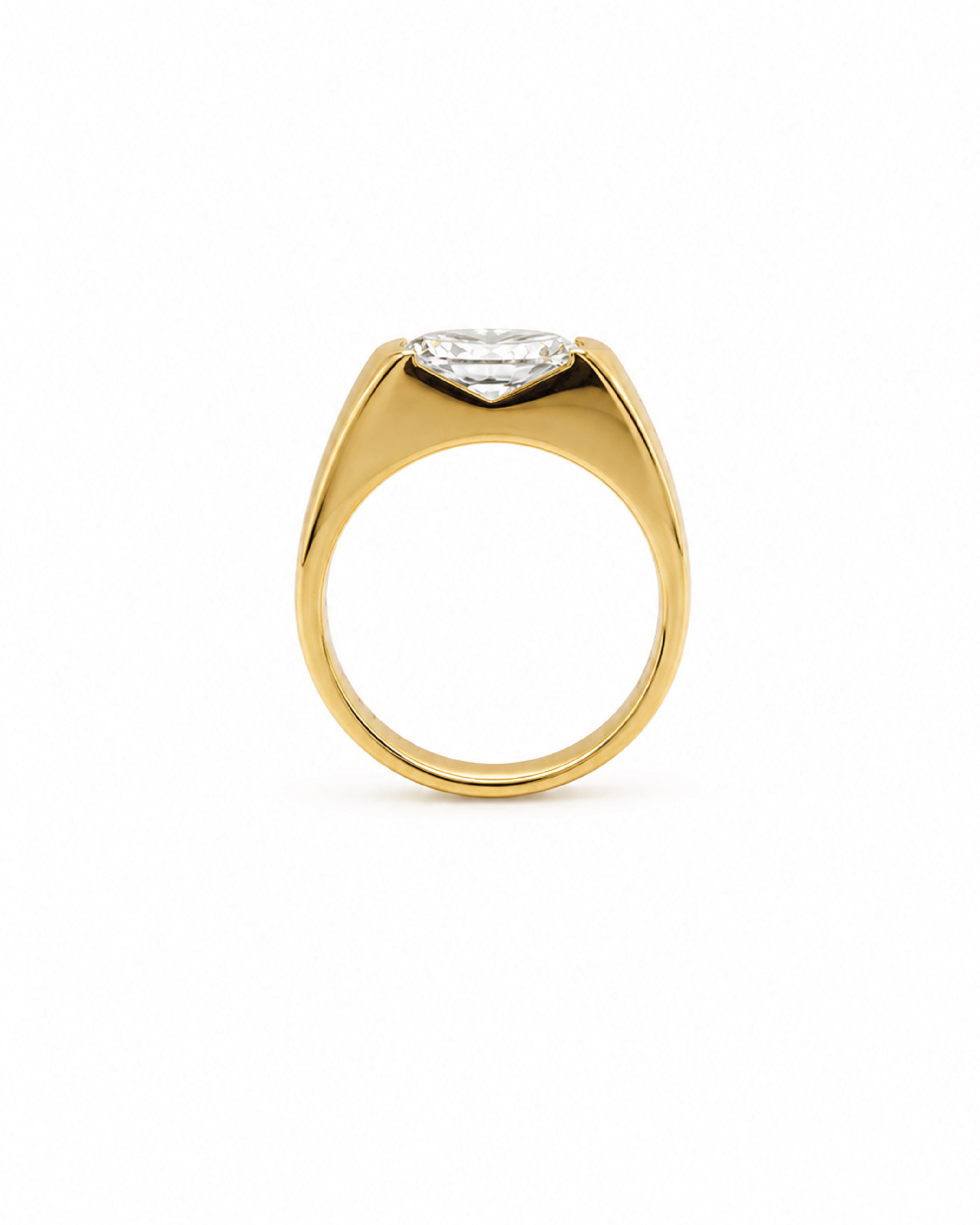 East-west oval diamond engagement ring, wide gold band