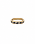 Vintage blue sapphire and diamond channel band in 14K yellow gold by Alexandra Mann Jewelry