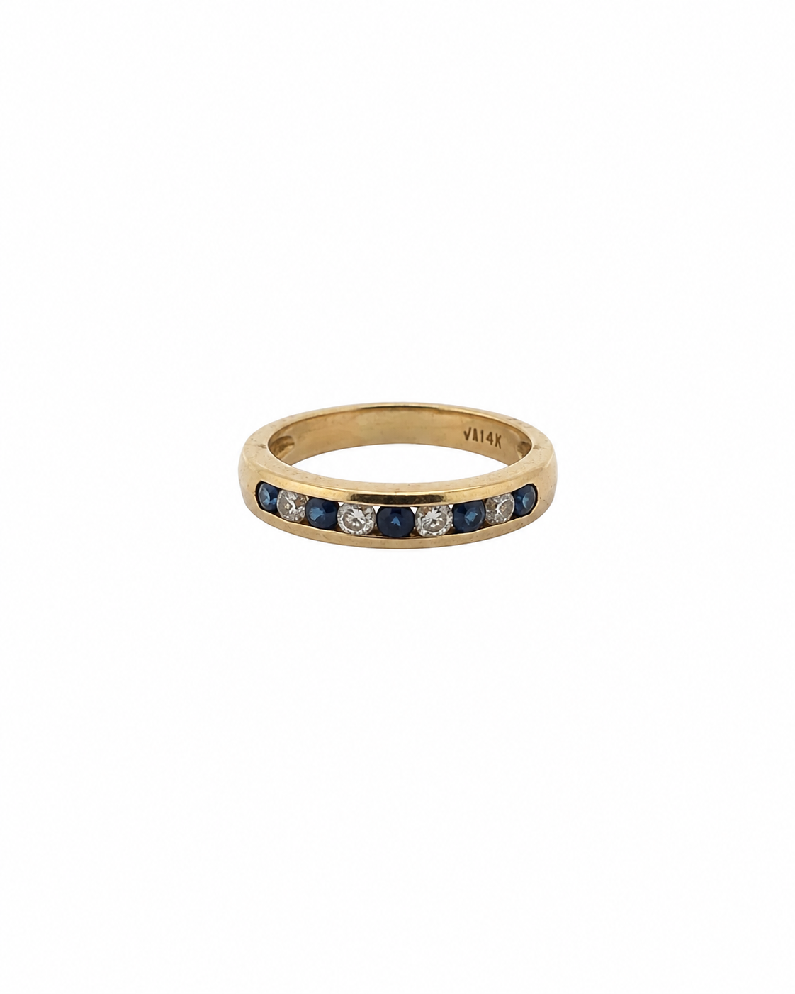 Vintage blue sapphire and diamond channel band in 14K yellow gold by Alexandra Mann Jewelry