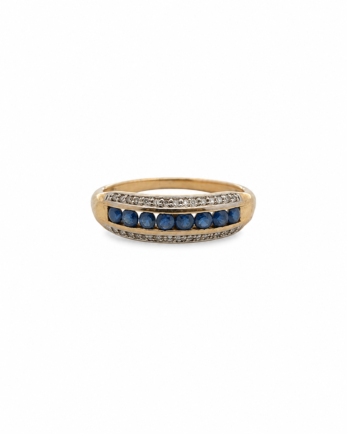Vintage blue sapphire and diamond channel ring in 14K yellow gold by Alexandra Mann Jewelry