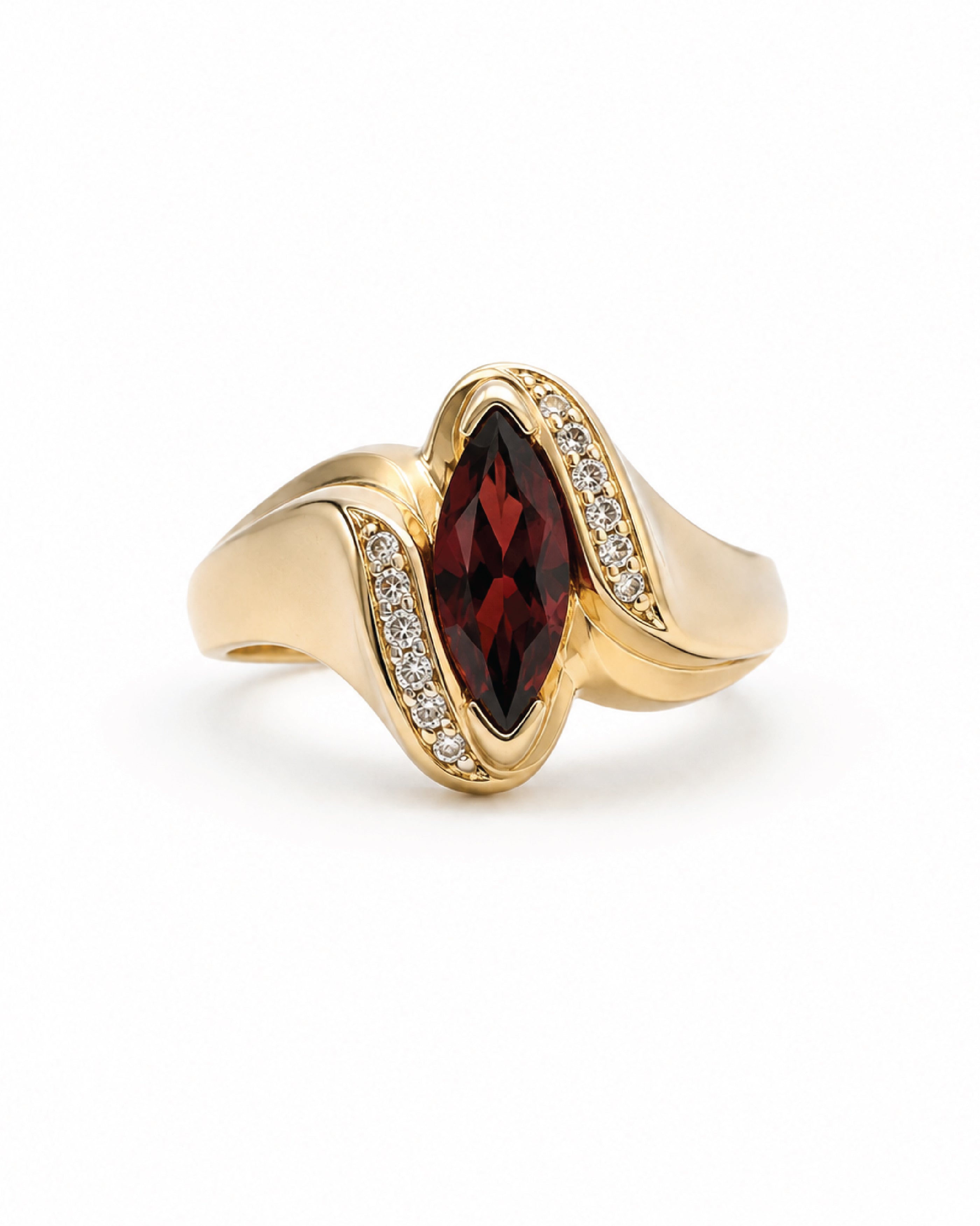 A gold ring featuring a marquise-cut garnet in the center, surrounded by small diamonds along the wave-like setting, on a plain white background.