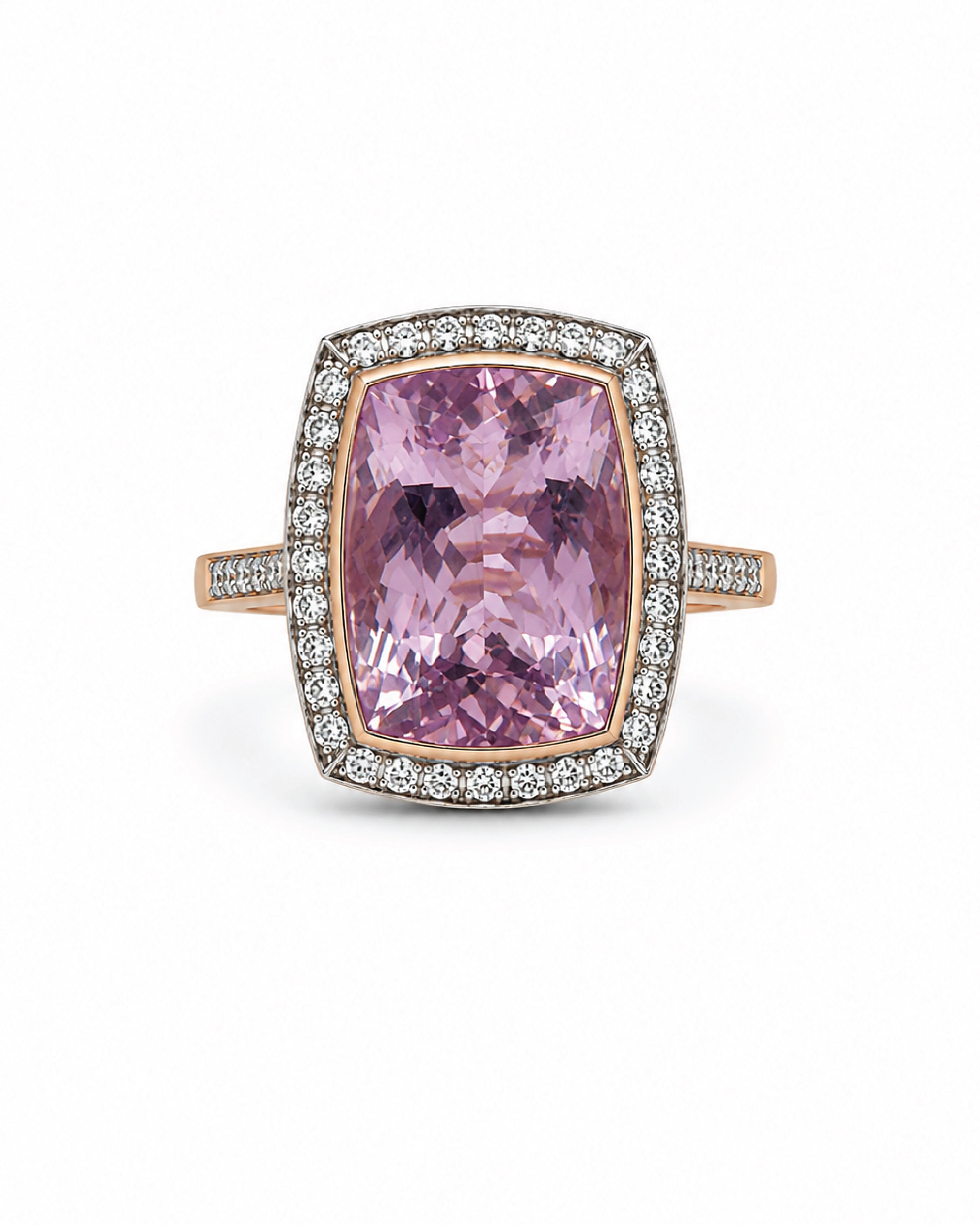 A cushion-cut morganite ring with a halo of small diamonds and a yellow gold band, shown on a plain white background.