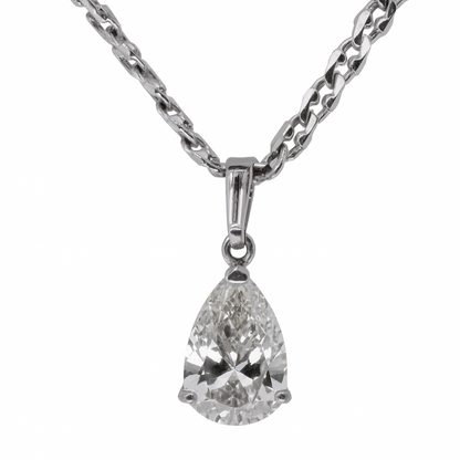 Pear-shaped diamond pendant on a chain against a white background