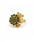 A gold ring featuring a cluster of round peridots in the center and a fan-like gold setting, shown on a plain white background.