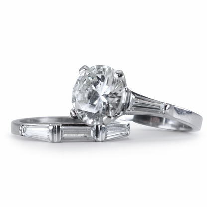 Diamond ring with a white gold band on a white background