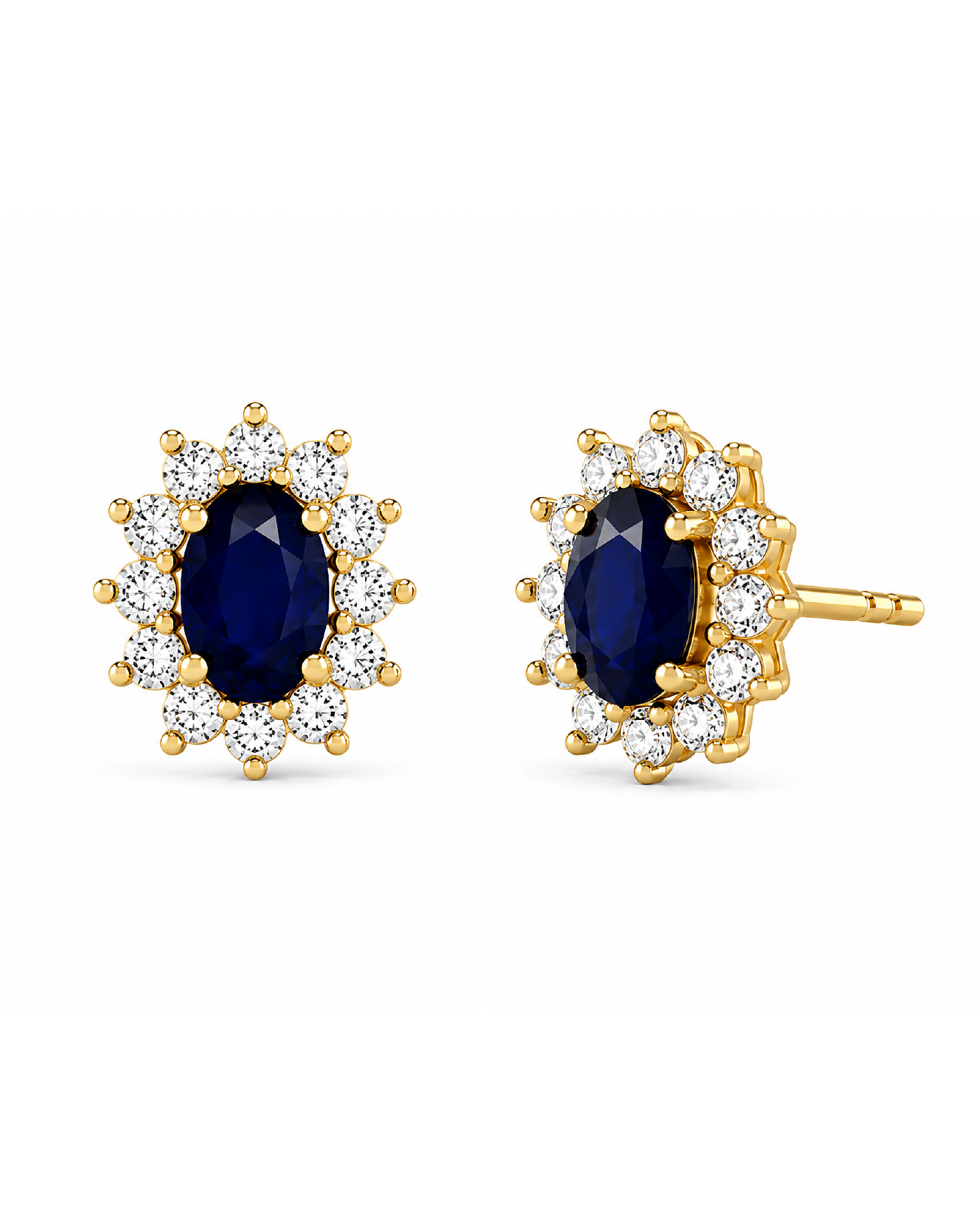 A pair of gold halo stud earrings featuring oval-cut dark blue sapphires surrounded by small clear stones, shown on a plain white background.