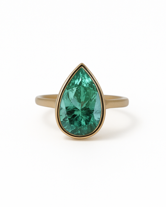Pear Shaped Emerald Bezel Set Ring